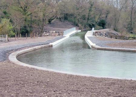 Water flows across the new Aqueduct