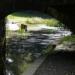 A view under the skew bridge into Aberdulais Basin